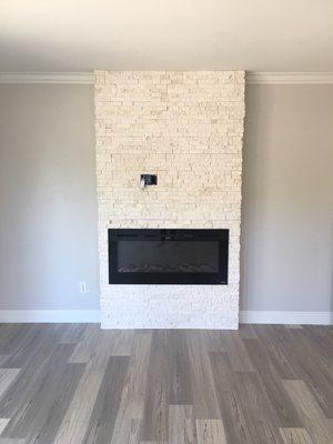 Custom built in wall and tile for this electric fireplace