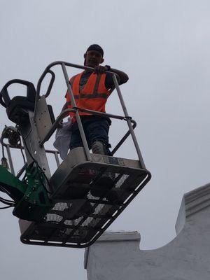 Painting on high roof