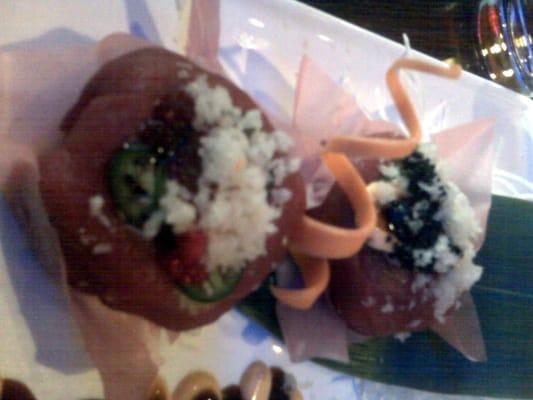 Tuna Dumpling: Spicy lobster, avocado, crunch wasabi, & tobiko wrapped inside tuna and a soybean seaweed