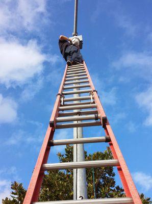 Hikvision PTZ (Pan Tilt Zoom) camera installation on a light post.