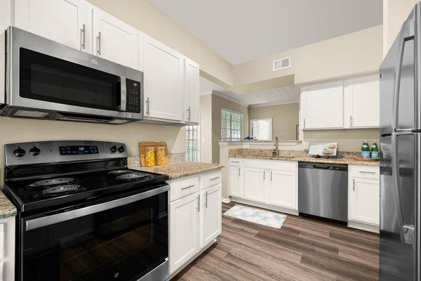 Kitchen with stainless steel appliances at The Lodge at Shavano Park