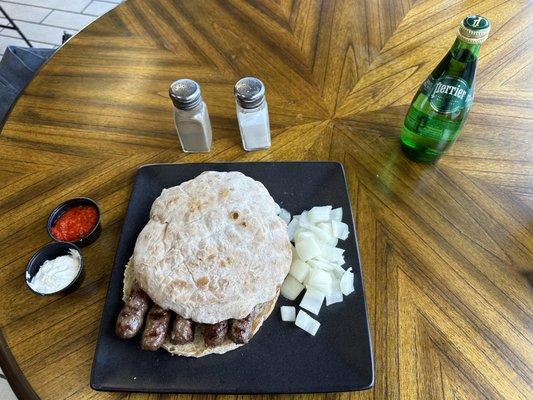 One of the very best meals ever, Cevapi!  Grilled beef links between lepinja (pita type bread) with raw onion.