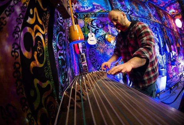 Jamming a Chinese Zither - I teach TONS of plucked stringed instruments, drums/percussion, Voice, Recording/Production, and MORE!