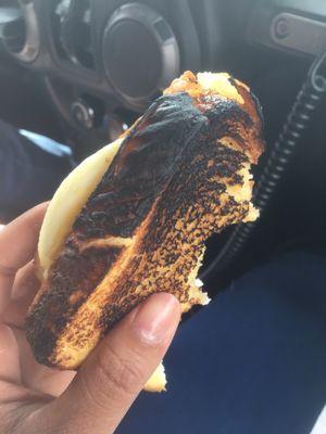 Burned Texas toast sandwich from here served to me like this.