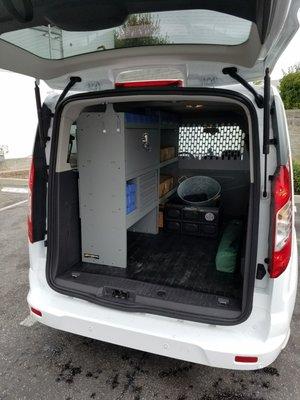 Built out a floor to convert this passenger van to cargo van