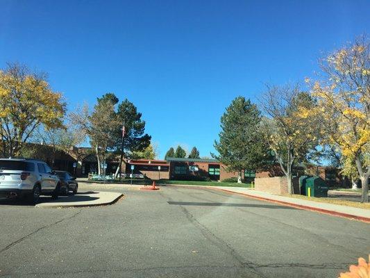 Front view from parking lot where buses load & unload and parent/visitors park.