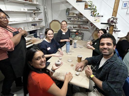 Students learning pottery