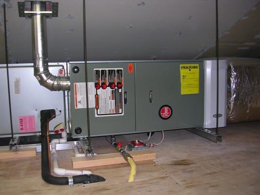 Rheem horizontal warm air furnace with central air conditioning and an AprilAire 2410 media filter