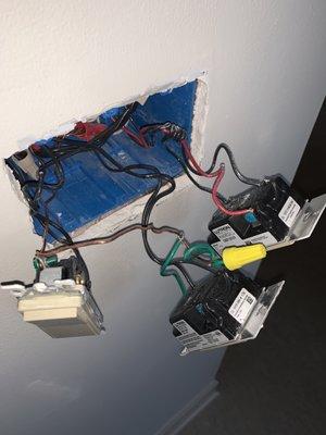 Wrong switches were installed, AND not wired according to electrical building code.