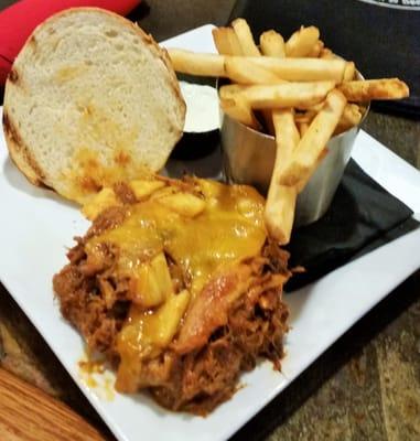 Pulled Pork sandwich special of the day with Frites and a chunky pineapple sauce.