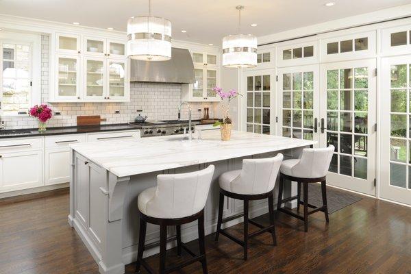 Our latest kitchen design and remodel featuring a  show-stopping Carrara marble center island. Gorgeous!