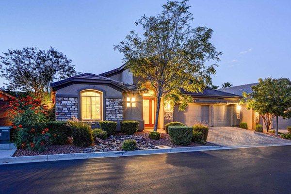 Amazing single story located on the footsteps of Summerlin South. Highly sought after gated community with 3 car garage.