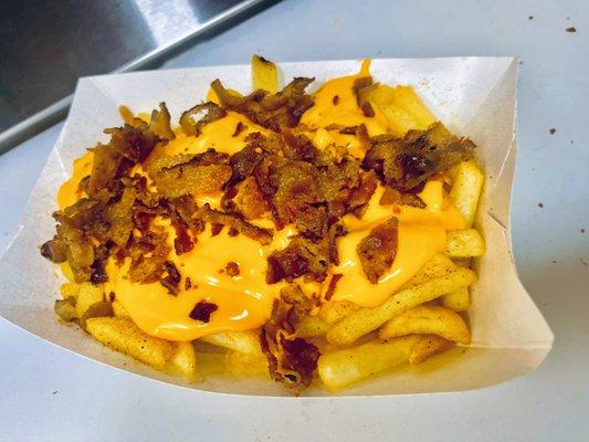 All American Fries! Cheese and Bacon on Seasoned, Crispy Fries!