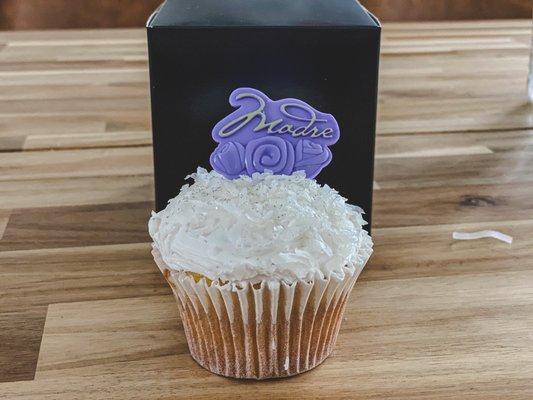 Coconut cream cupcakes -Vanilla cupcake filled with coconut cream, topped with cream cheese frosting and shredded coconut