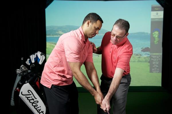 Golf Instruction on the High Def Simulator which provides ball and club data through the software program.